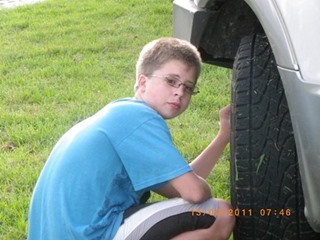 Jessie, birthday Boy, setting tyre pressure.jpg
