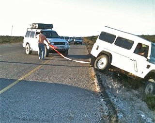 And an unassuming Pajero quietly did her work :-) The Landy was towed further, onto the tar.....to get grip !!
