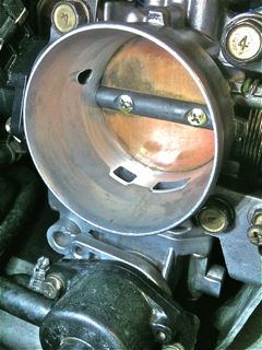 What the throttle body should look like, after thorough clean-out (including rear inlet housing) &amp; no play on butterfly shaft