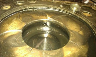 Piston hole