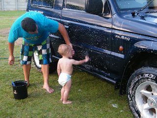 My boy helping me clean chucky after  the mud.