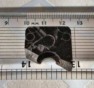 Piece of bracket found in sump