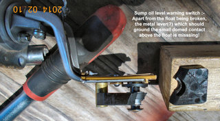 Broken sump oil level warning switch