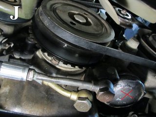X indicates the original position of the oil filter.