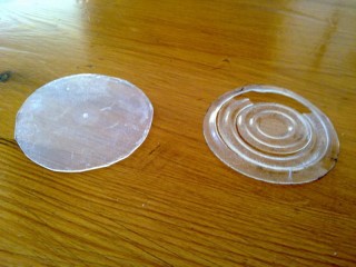 The new backplate (left) and the old flimsy one (right)