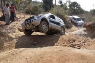 3wheels on the ground, 1 in the air spinning with lowrange and rear diff lock engaged
