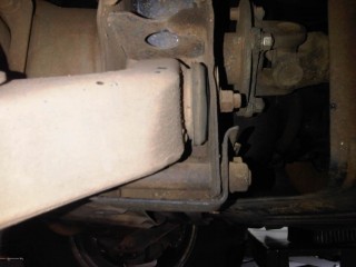 After spacer fitted with wheel haning the arm was nto close to he bolt. Could still fit finger tip in there easily