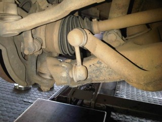 CV angle hanging free, top arm disconnected and bar not touching bottom bolt