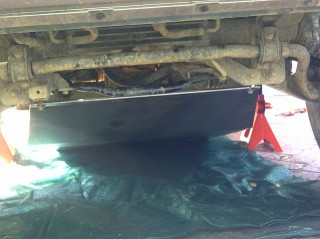 4- Hooked into lower mounting bolts to bashplate.jpg