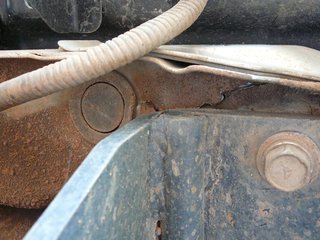 Cracks next to the mounting point