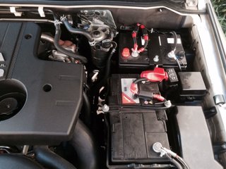 New 80AH deep cycle fitted in the 'hole' at the back.