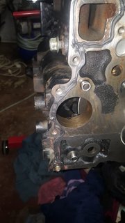 Upper balance shaft port with sealant applied adjacent