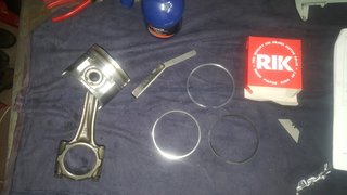 New piston, bearings, gudgeon pin, Riken rings, and circlips.