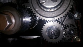 Left - main crank, top - timing chain idler sprocket, bottom middle - idler sprocket, bottom right - lower balance shaft.