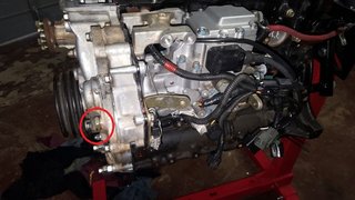 Side view of injector pump fitted